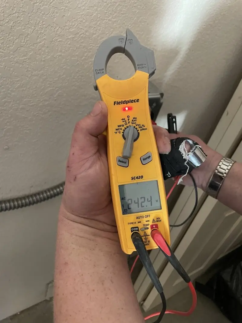 Voltage testing with clamp meter during Hot Tub / Pool Electrical Wiring in Indianapolis